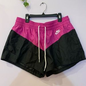 Nike Women’s Heritage Shorts. Size Large. NEVER WORN. Swishy material.